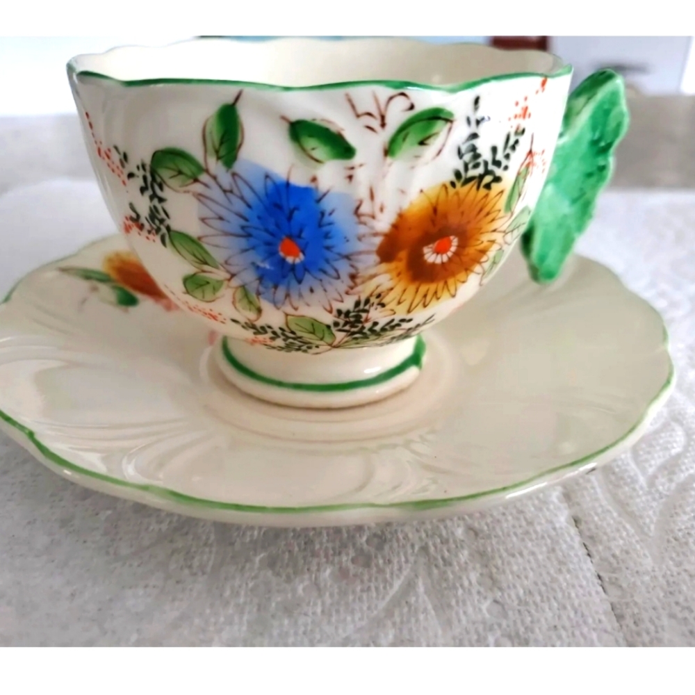 Antique Tea Cup and Saucer Japan hand painted leaf handle
